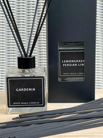  square glass reed diffuser bottle with a black label reading "GARDENIA" and Lemongrass , Persian 